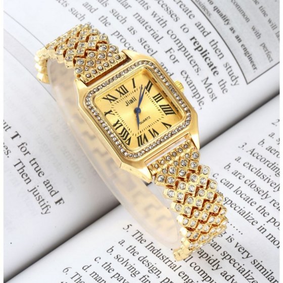 ساعت زنانه فول نگین بند استیل مجلسی طلایی jiali +باطری اضافی کد1889