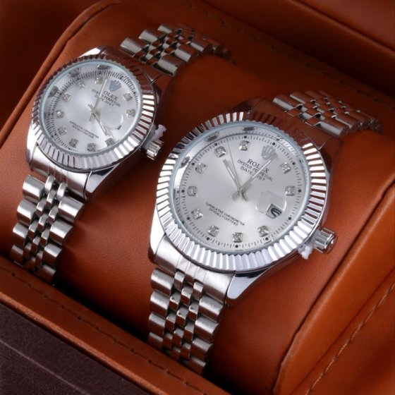 ست ساعت مچی بند استیل نقره ایی صفحه سفید رولکس+باطری اضافی  کد1953