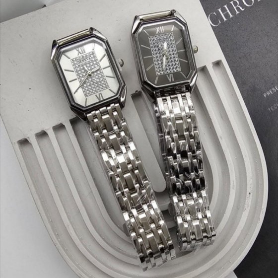 ساعت مچی زنانه جینوا صفحه مستطیلی بند نقره ایی کد1996